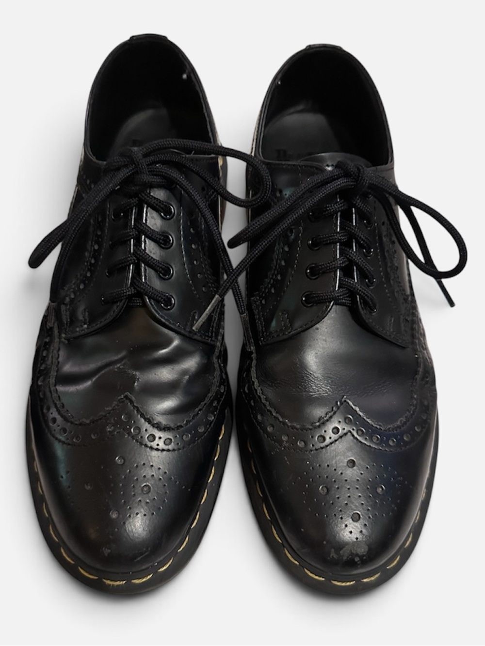 Dr. Martens Black Leather Wingtip Oxfords with Yellow Stitching